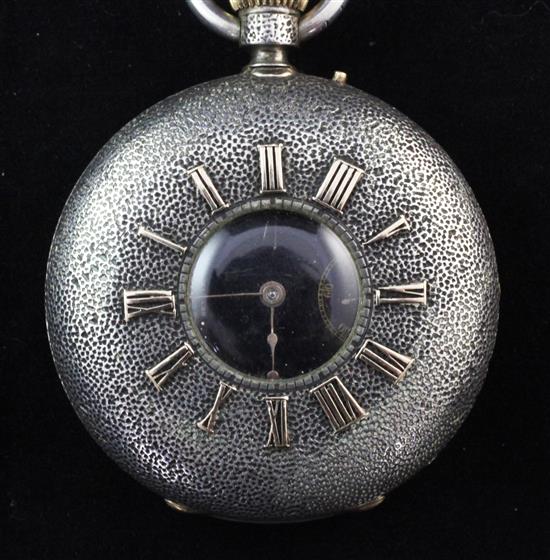 A late 19th/early 20th century Swiss textured gun metal keyless lever half hunter pocket watch